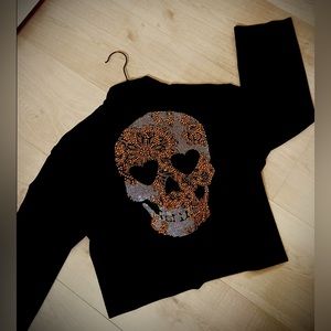 Black velvet shrug. Gold & white beaded skeleton appliqué on the bag.